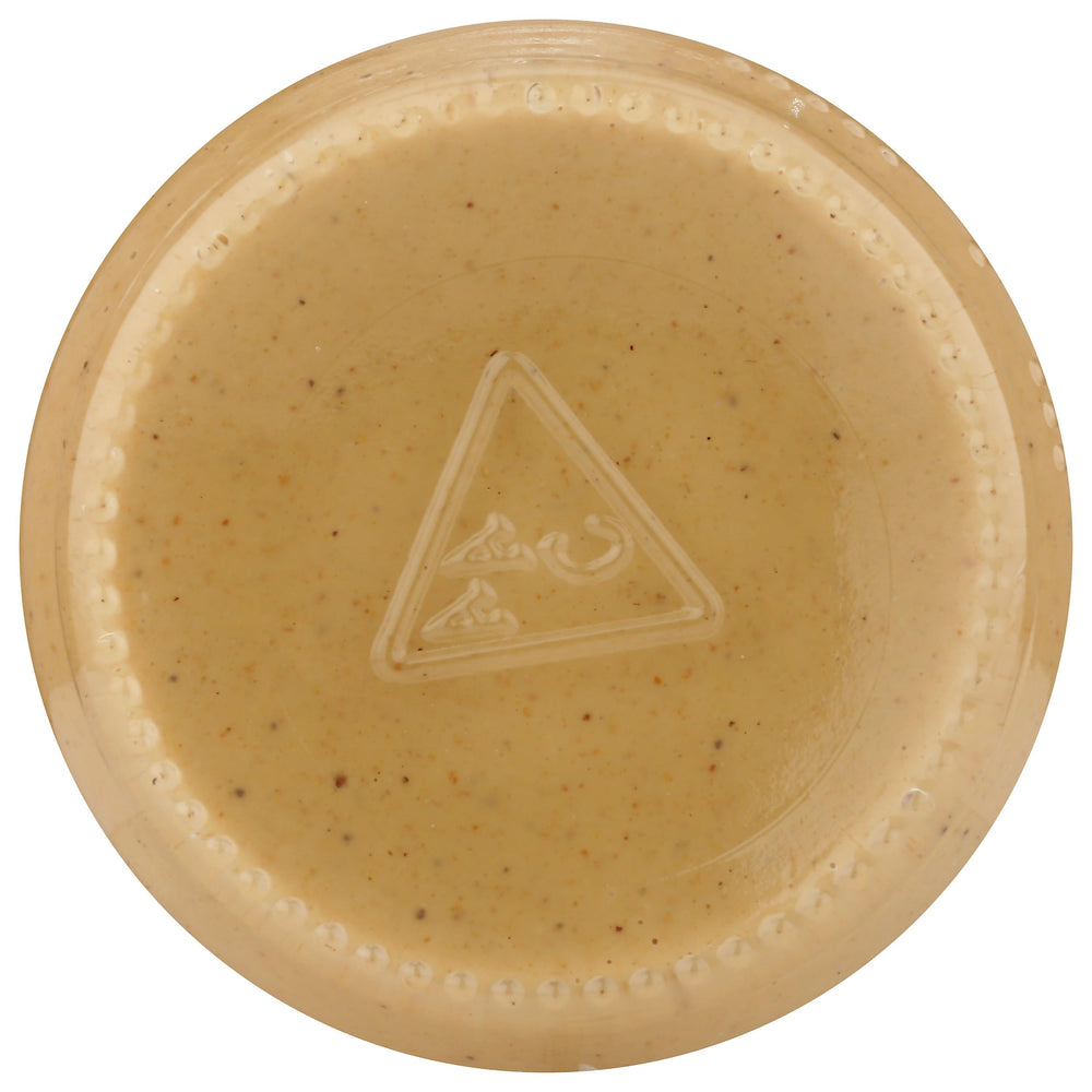 Close-up of Maisie Jane's cashew butter spread ready for quick recipes.
