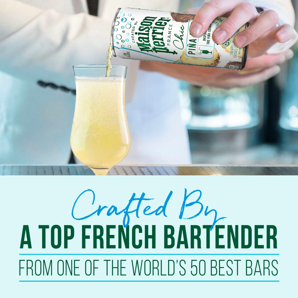 Close-up of bubbles in Maison Perrier Chic Pina Fizz glass for a refreshing sip.