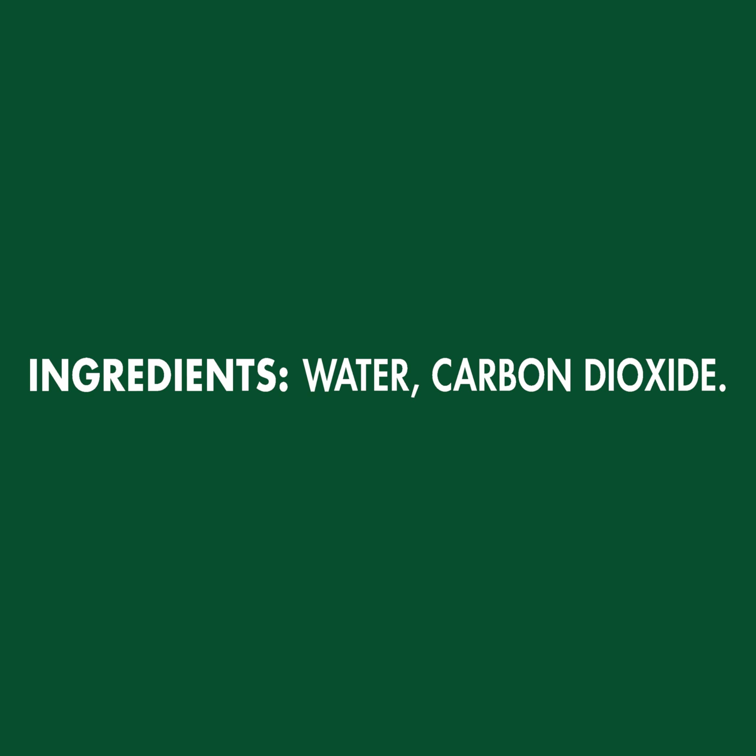 Bubbles rising in a glass of Maison Perrier Ultimate sparkling water.