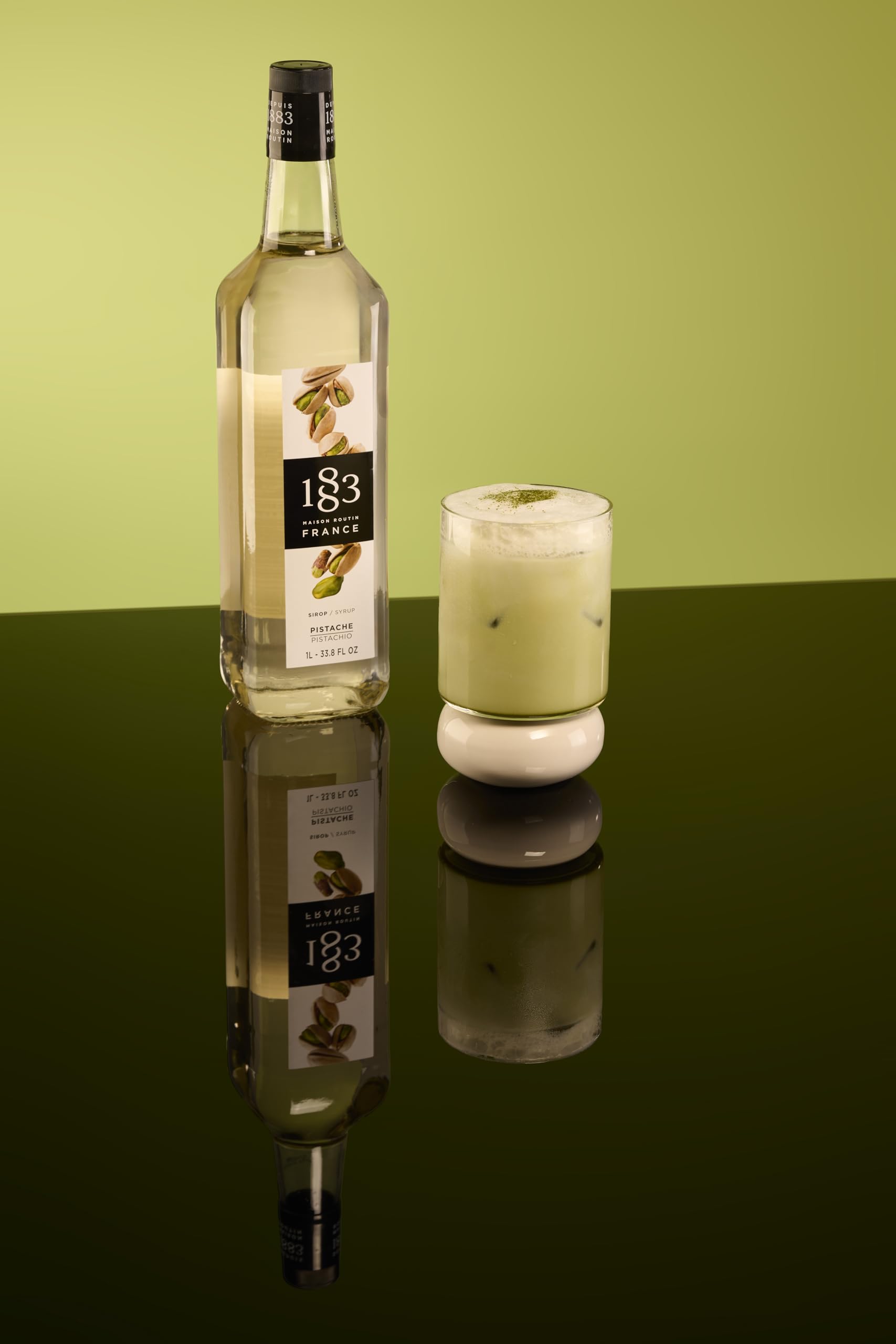 1883 Pistachio Syrup dessert drizzle enhancing ice cream.