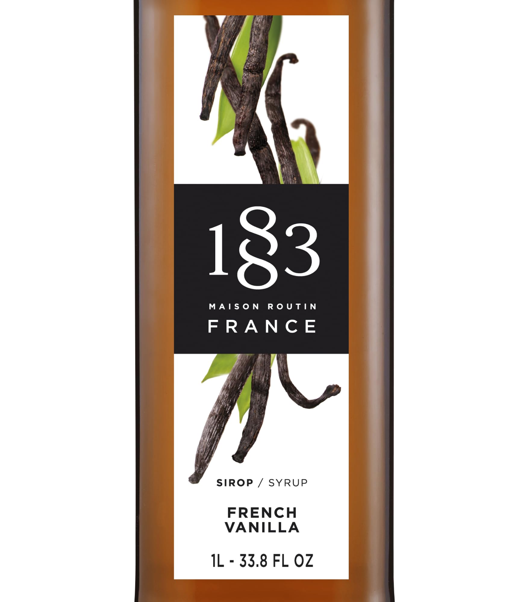 1883 Maison Routin vanilla syrup bottle pour, ideal for coffee and cocktails.
