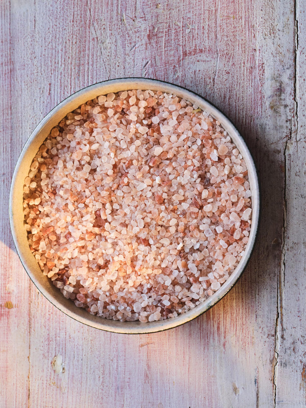 Pouring Maldon Himalayan pink salt reveals flaky crystals ideal for curries