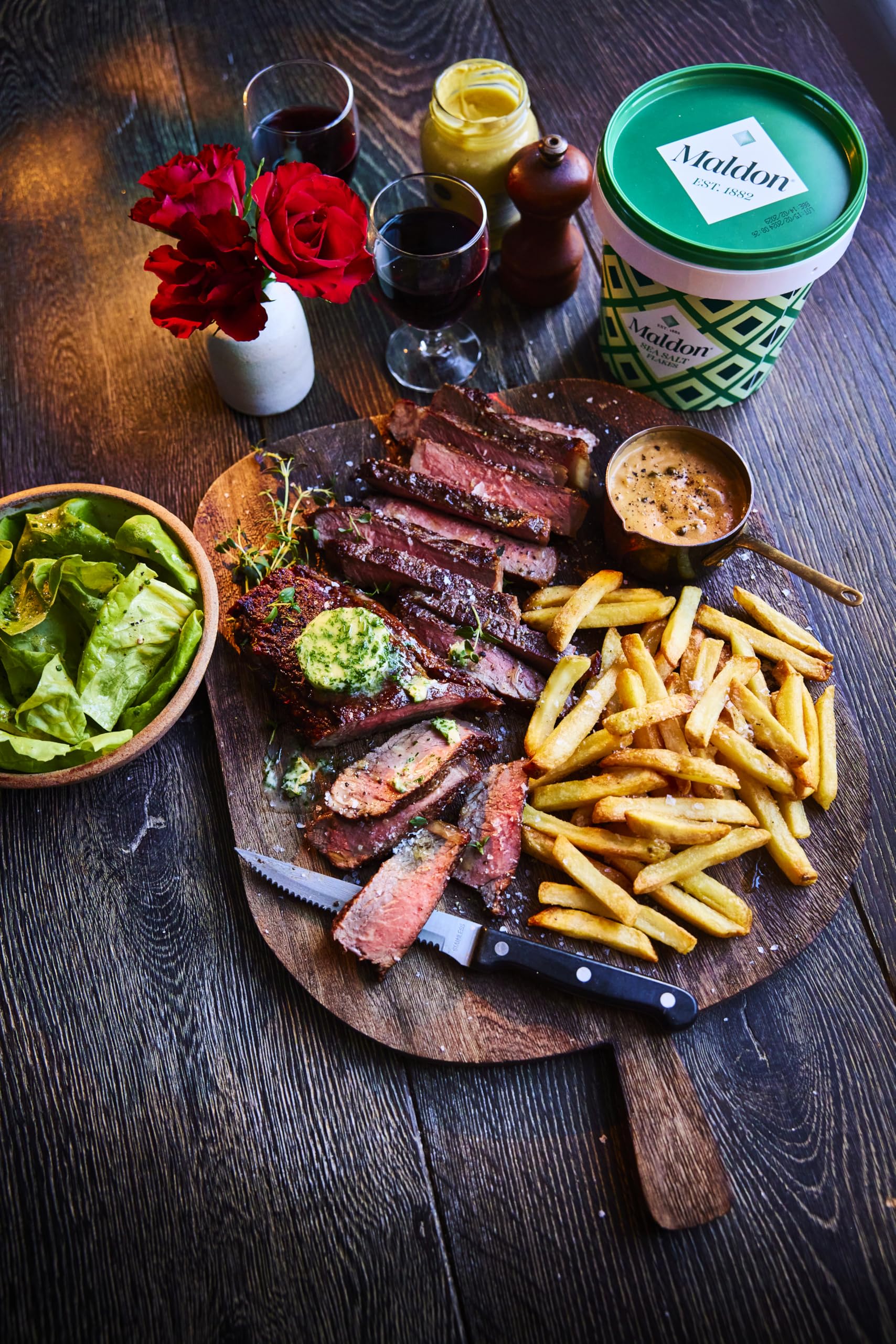 Maldon Sea Salt flakes on grilled meats enhance crust.