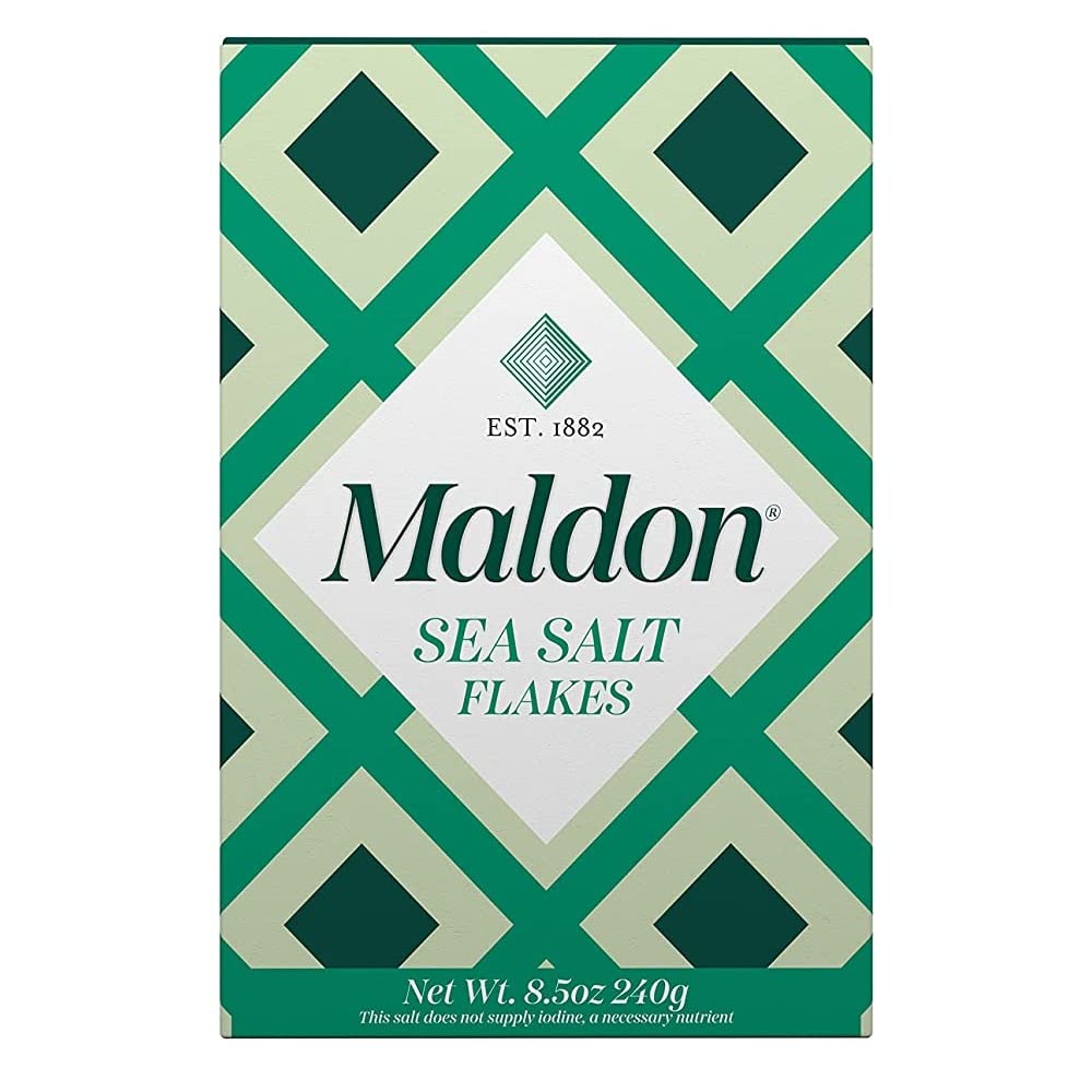 Maldon sea salt flakes in a 240 g pack showing pyramid crystal structure for precise seasoning.