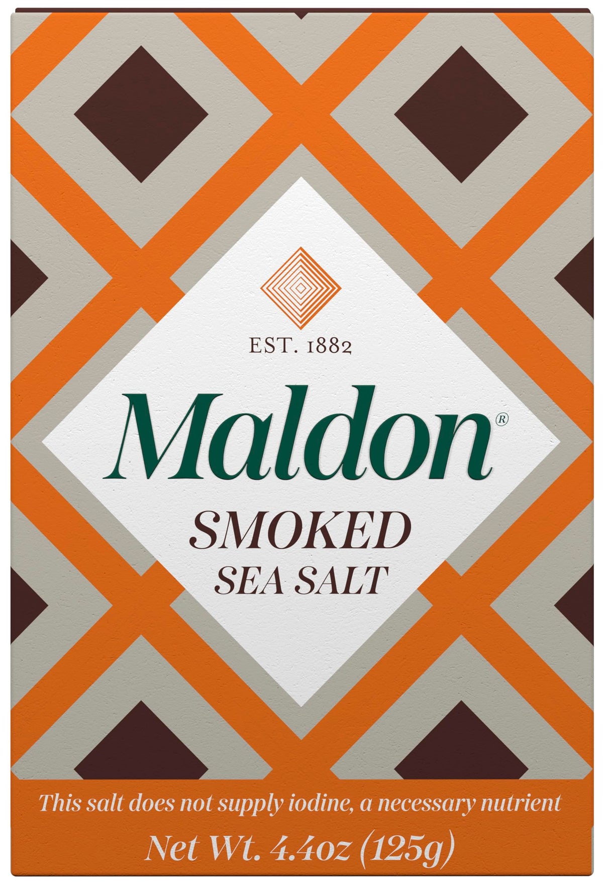 Maldon smoked sea salt flakes close-up; pyramid texture for seafood finishing.