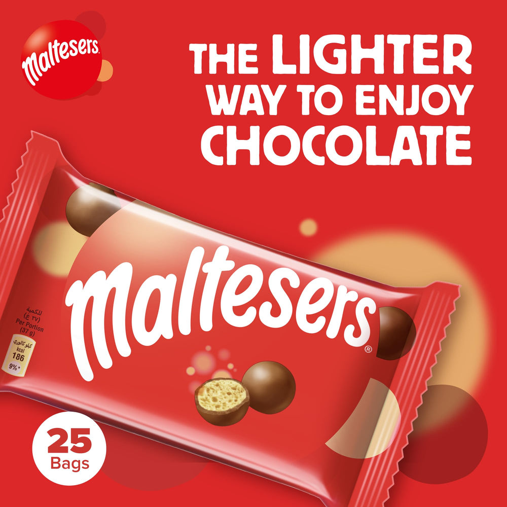 Open Maltesers box with candies close-up, ready to snack