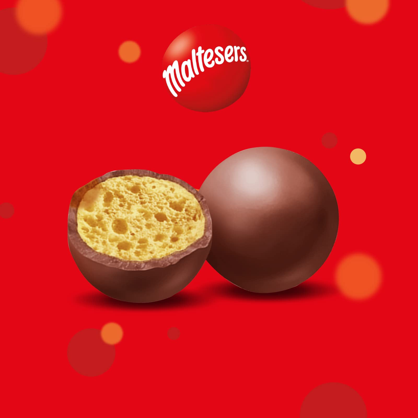 Maltesers Celebration 650g closeup candies, crisp chocolate shells and airy centers.