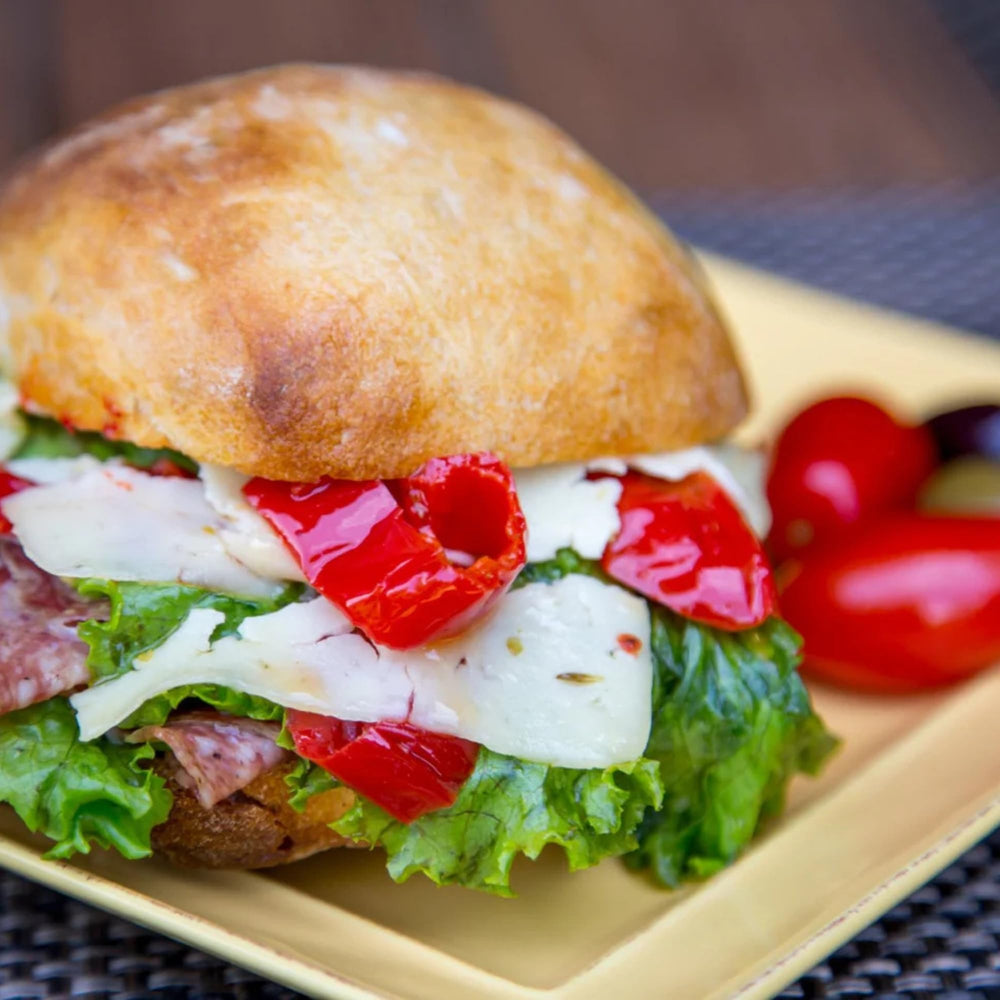 Burger topping option with Mama Lil’s peppers in oil for a tangy kick.