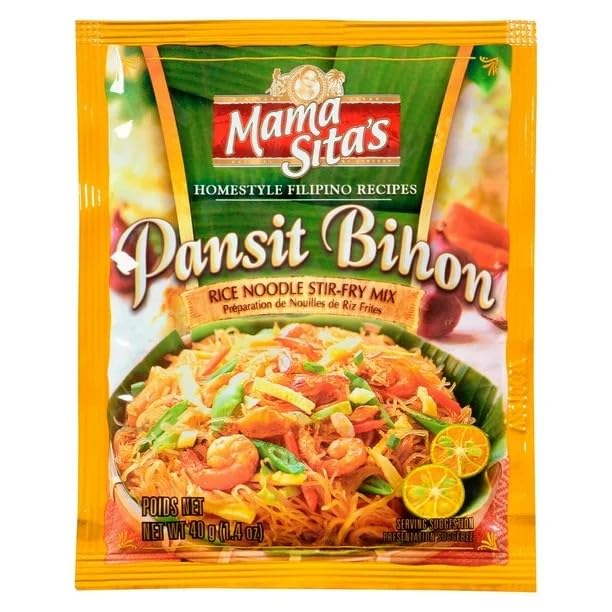 Mama Sita's Pansit Bihon stir-fry sizzling in a wok.