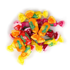 Orange flavor piece on table, bright citrus notes.