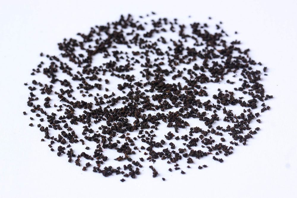 Mana Organics Chota Tingrai Estate indicates single-origin Assam tea with depth.