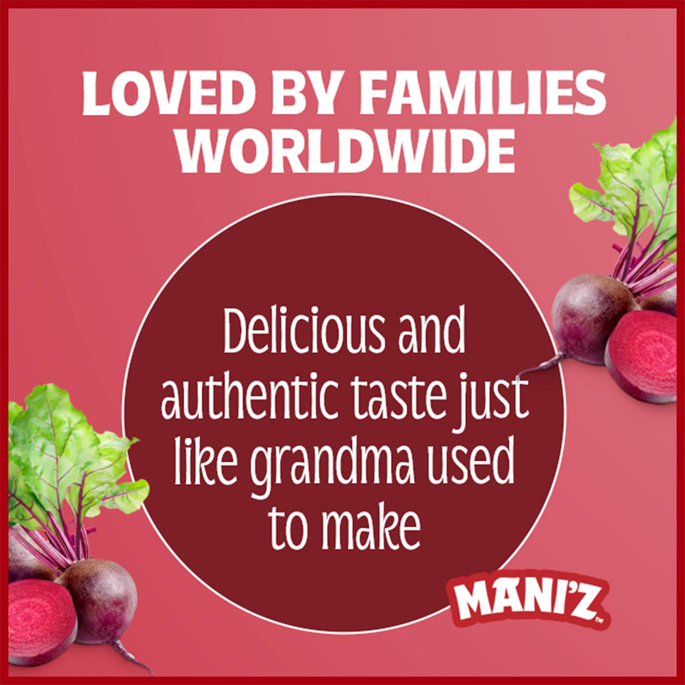 Ruby-colored Manischewitz Borscht displayed in a glass.