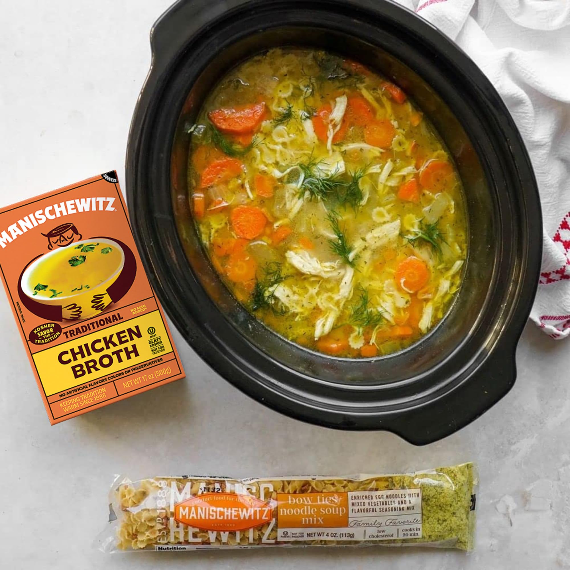 Manischewitz chicken broth simmering in a pot creates a rich base