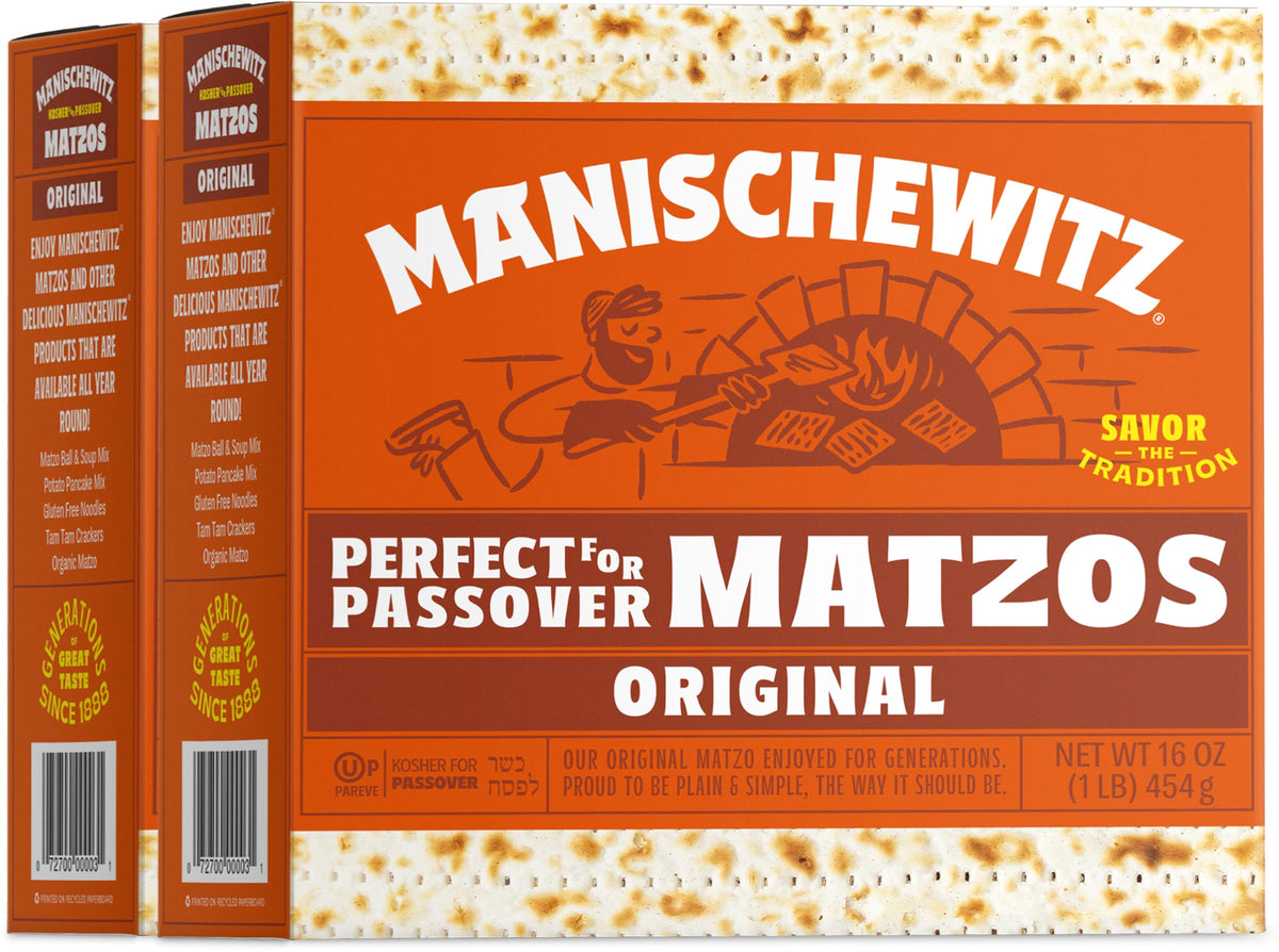 Manischewitz matzos fresh and crispy on a board, ready for spreads and toppings.