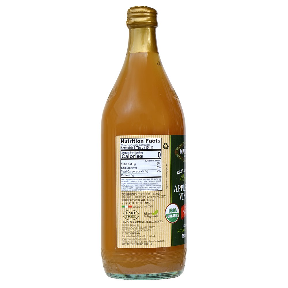 Mantova Apple Cider Vinegar pour glass highlighting tangy aroma for marinades.