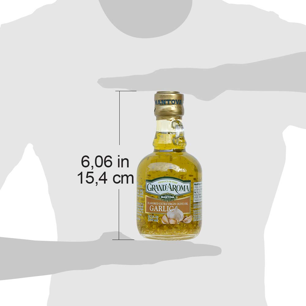 Mantova Garlic Grand'Aroma olive oil on a dining table ready to drizzle.