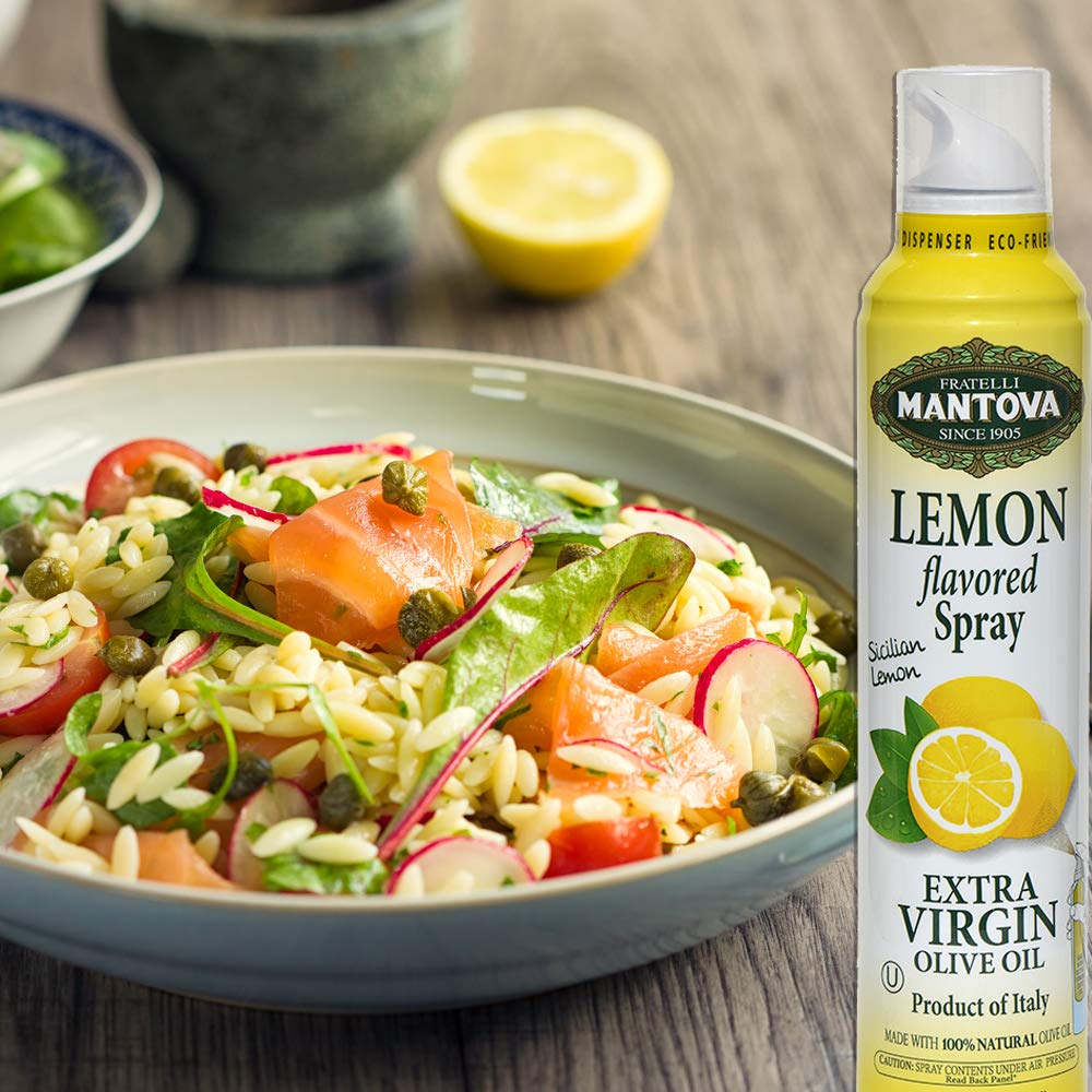 Mantova Italian EVOO spray bottle showcased with baked bread.