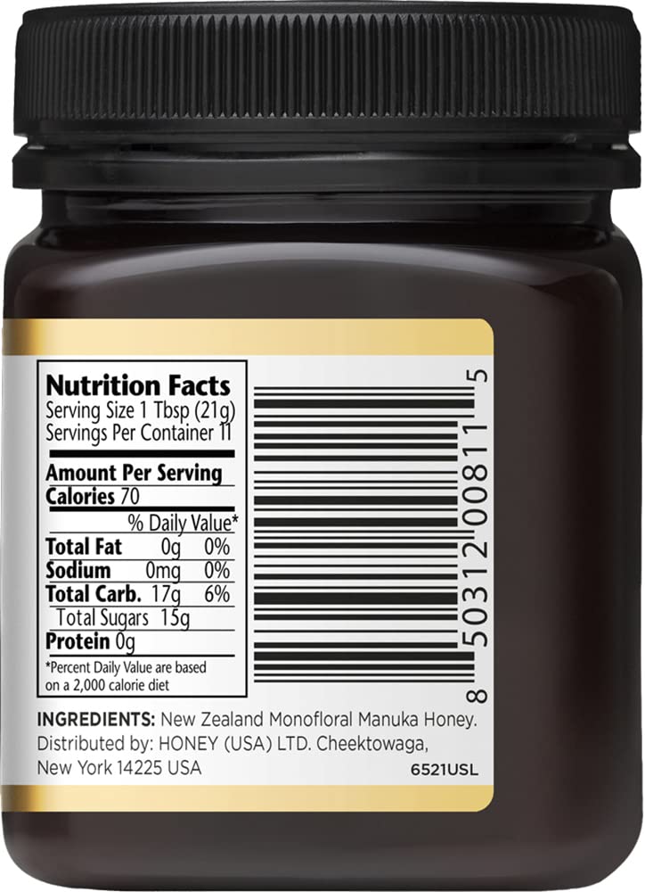 Manuka Doctor MGO 525 bottle pour showing thick amber honey