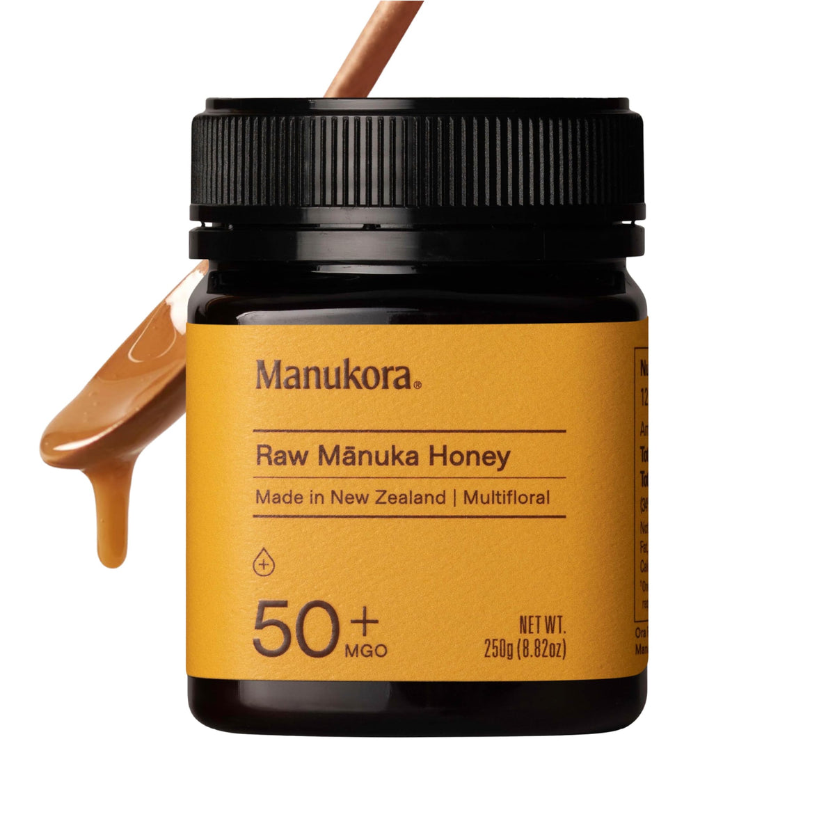 Manukora raw Manuka honey MGO 50+ bottle close-up, creamy texture for daily use