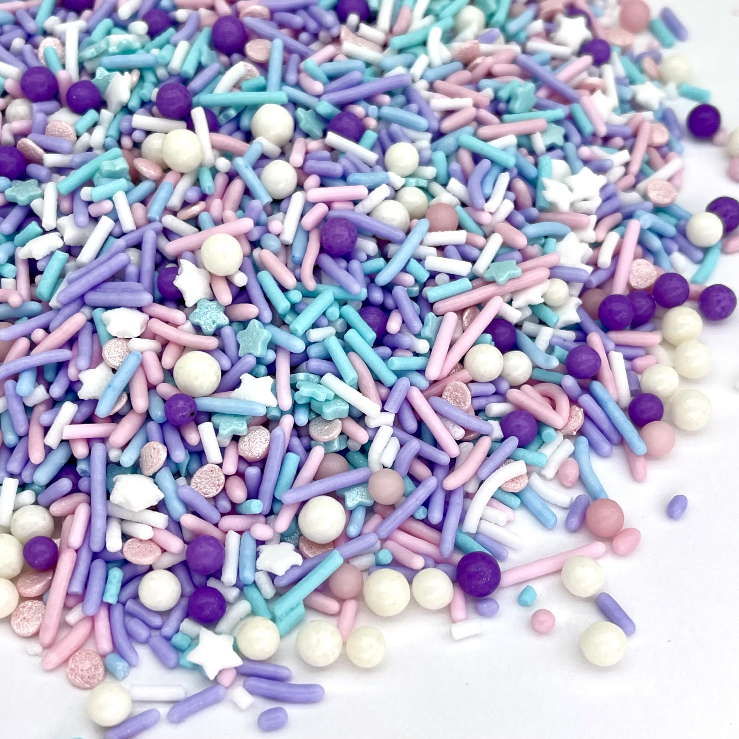 Manvscakes cookies and cupcakes decorated with sprinkle mix for eye catching treats.