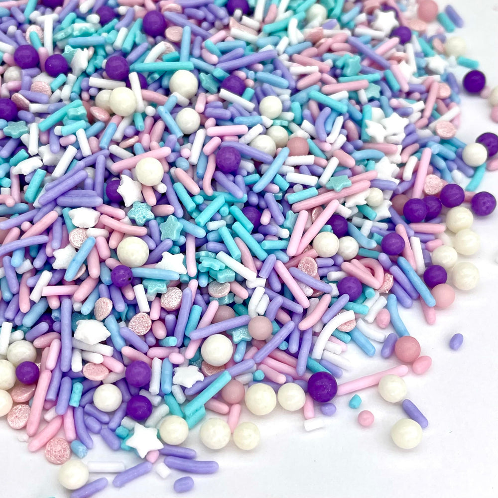 Manvscakes cookies and cupcakes decorated with sprinkle mix for eye catching treats.