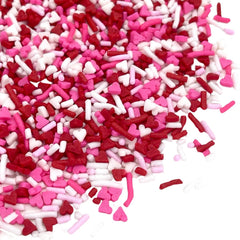 Manvscakes Valentine sprinkles close-up pink and red jimmies ideal for festive cake and cookie decorations.