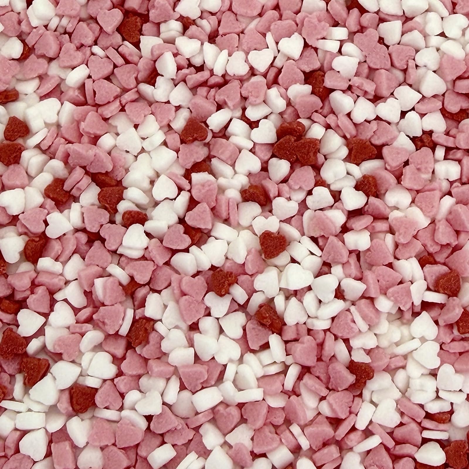 Manvscakes mini heart confetti adds color to cakes and desserts.