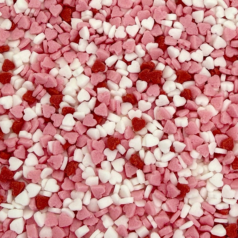 Manvscakes mini heart confetti adds color to cakes and desserts.