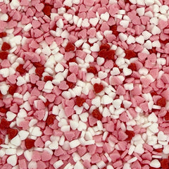Manvscakes mini heart confetti adds color to cakes and desserts.