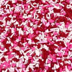 Manvscakes Valentine sprinkles on ice cream and donuts for bright desserts.