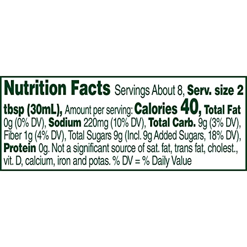Maple Grove Farms fat-free honey dijon dressing being poured over a salad