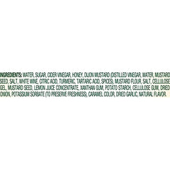 Maple Grove Farms fat-free honey dijon dressing on a fresh green salad
