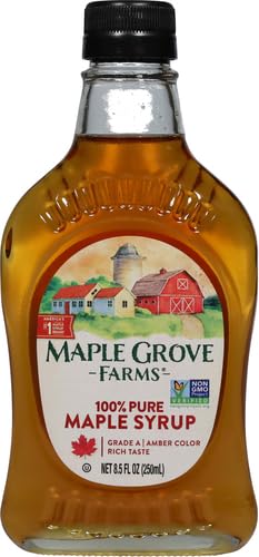 Pouring Maple Grove Farms syrup over waffles with smooth texture.