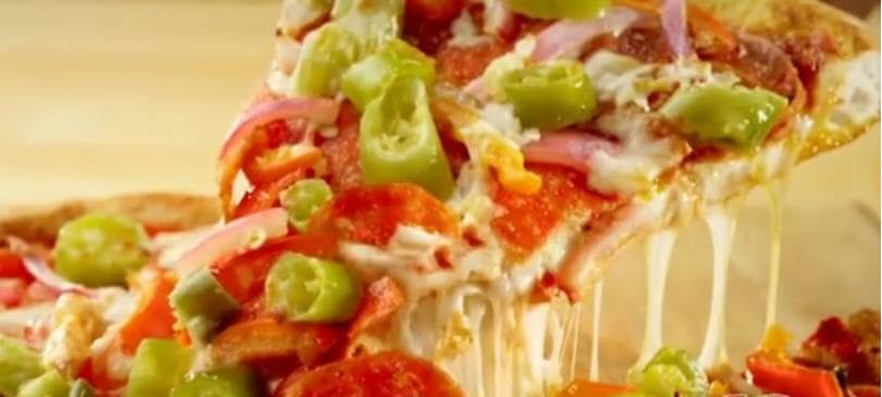 Marconi hot giardiniera sliced peppers close-up, ideal for sandwiches.