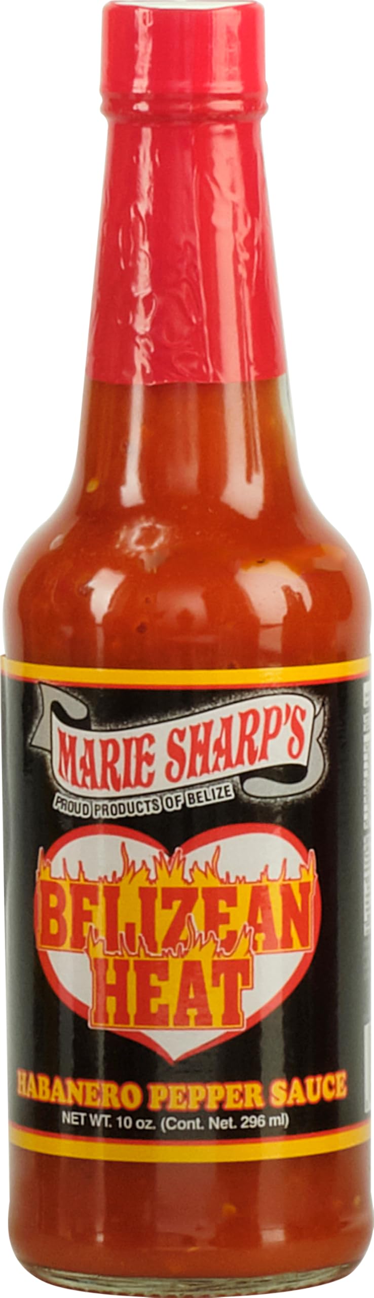 Pouring Marie Sharp's Belizean Heat onto a dish for fiery finish.