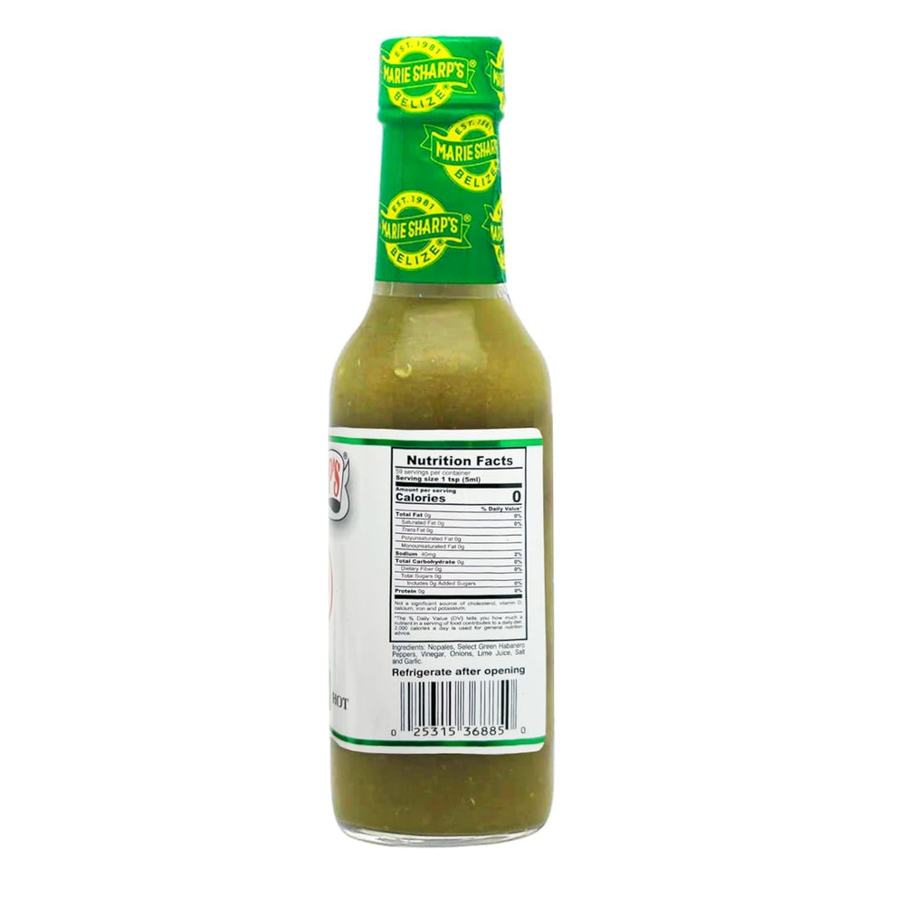 Marie Sharp's Green Habanero Sauce pour shot highlighting smooth texture for eggs and tacos.