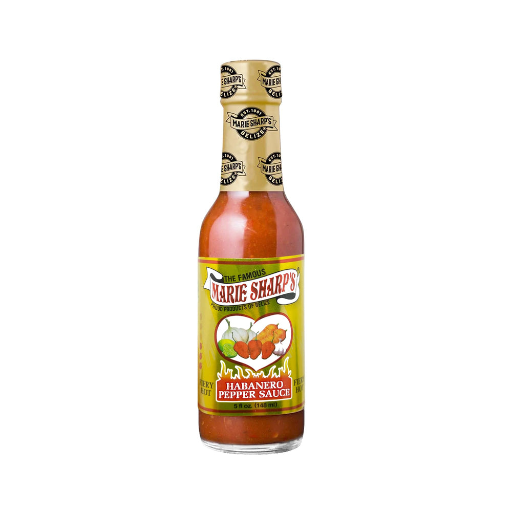 Marie Sharp's Fiery Hot sauce on grilled meats adds smoky heat