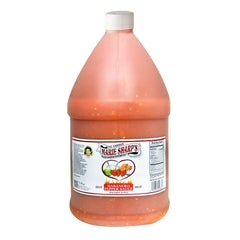 Marie Sharp's Hot Habanero bottle on kitchen shelf highlighting Belizean flavor