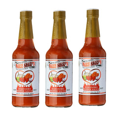 Marie Sharp's Hot Habanero Sauce bottle close-up highlighting vibrant peppers for bold flavor.