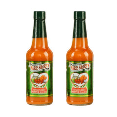 Marie Sharp's Mild Habanero Sauce bottle pour for a gentle kick.