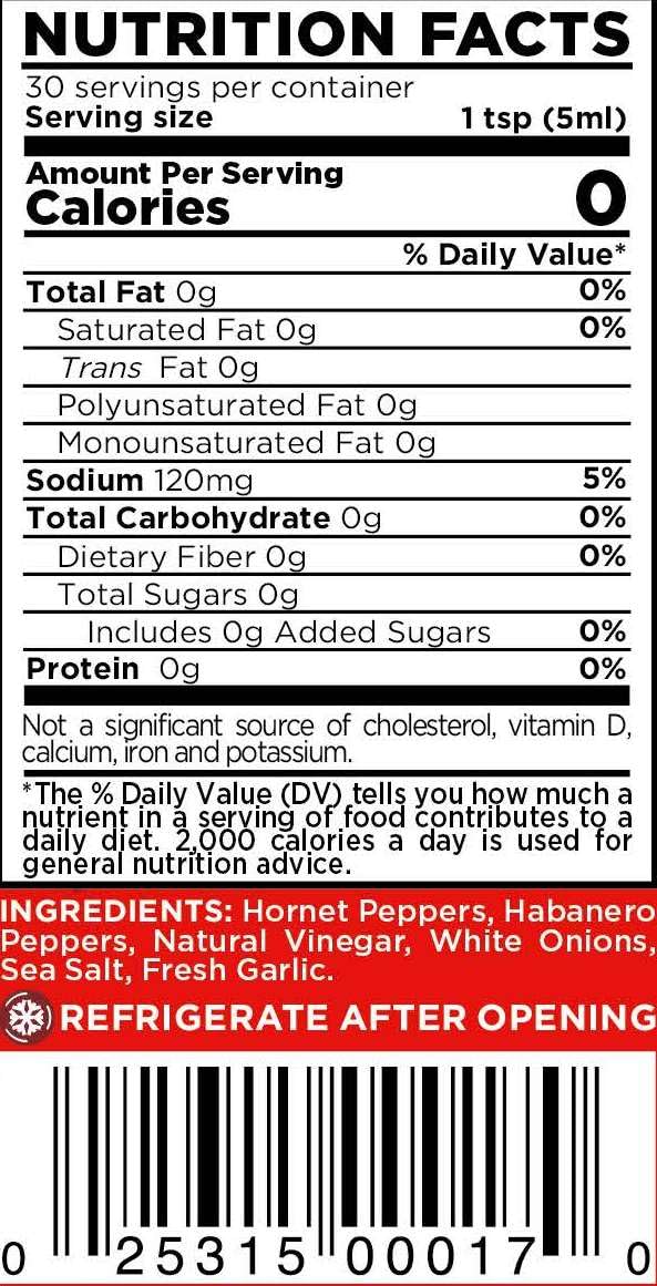 Close-up of Marie Sharp's Red Hornet label signaling Belizean authenticity