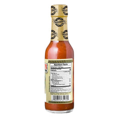 Pouring Marie Sharp's Smoked Habanero boosts flavor in marinades and burgers.