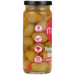 Serving on a tapas board with Mario Camacho Queen Olives stuffed with minced pimiento.