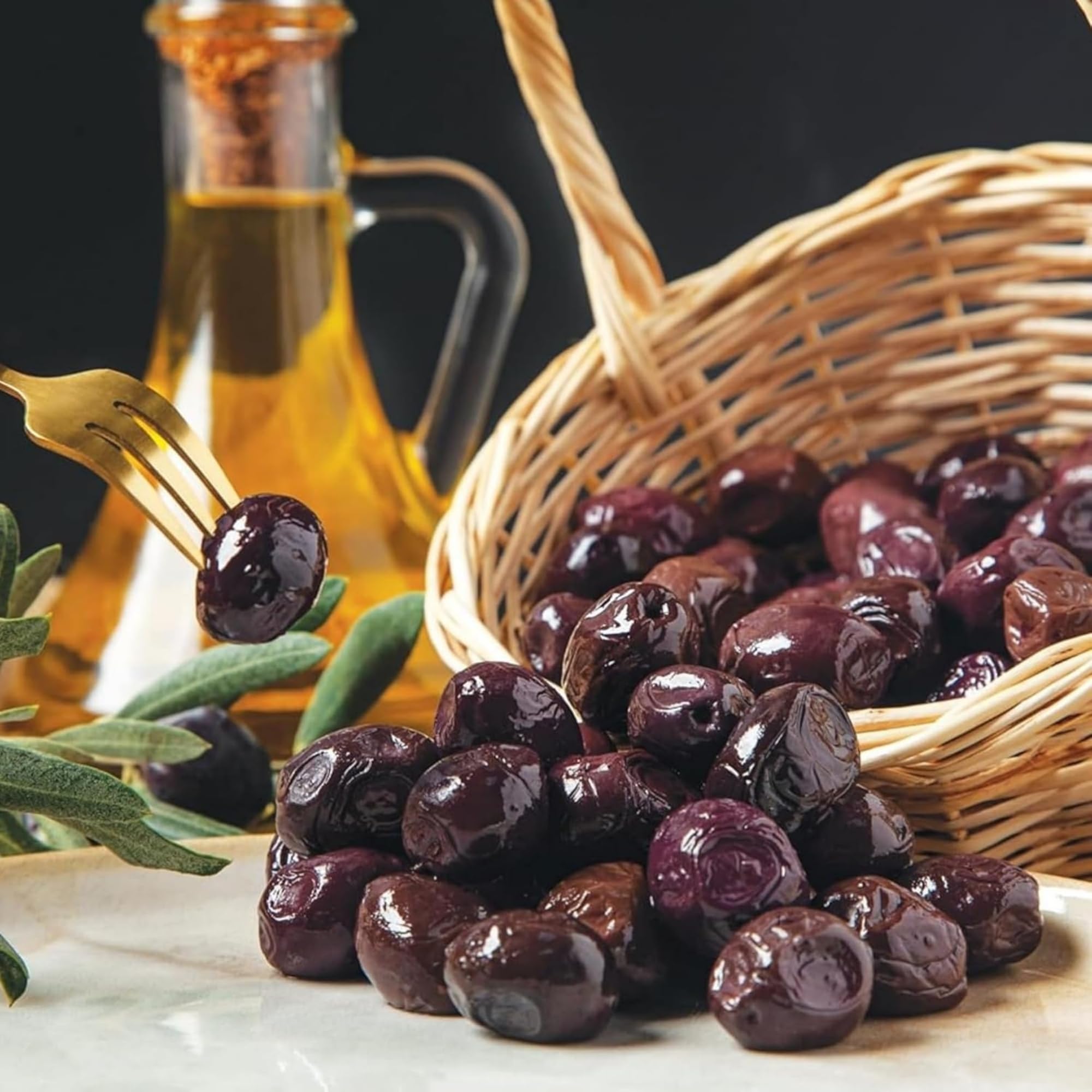 Marmarabirlik olives on a sandwich prep scene showcasing versatile snacking.