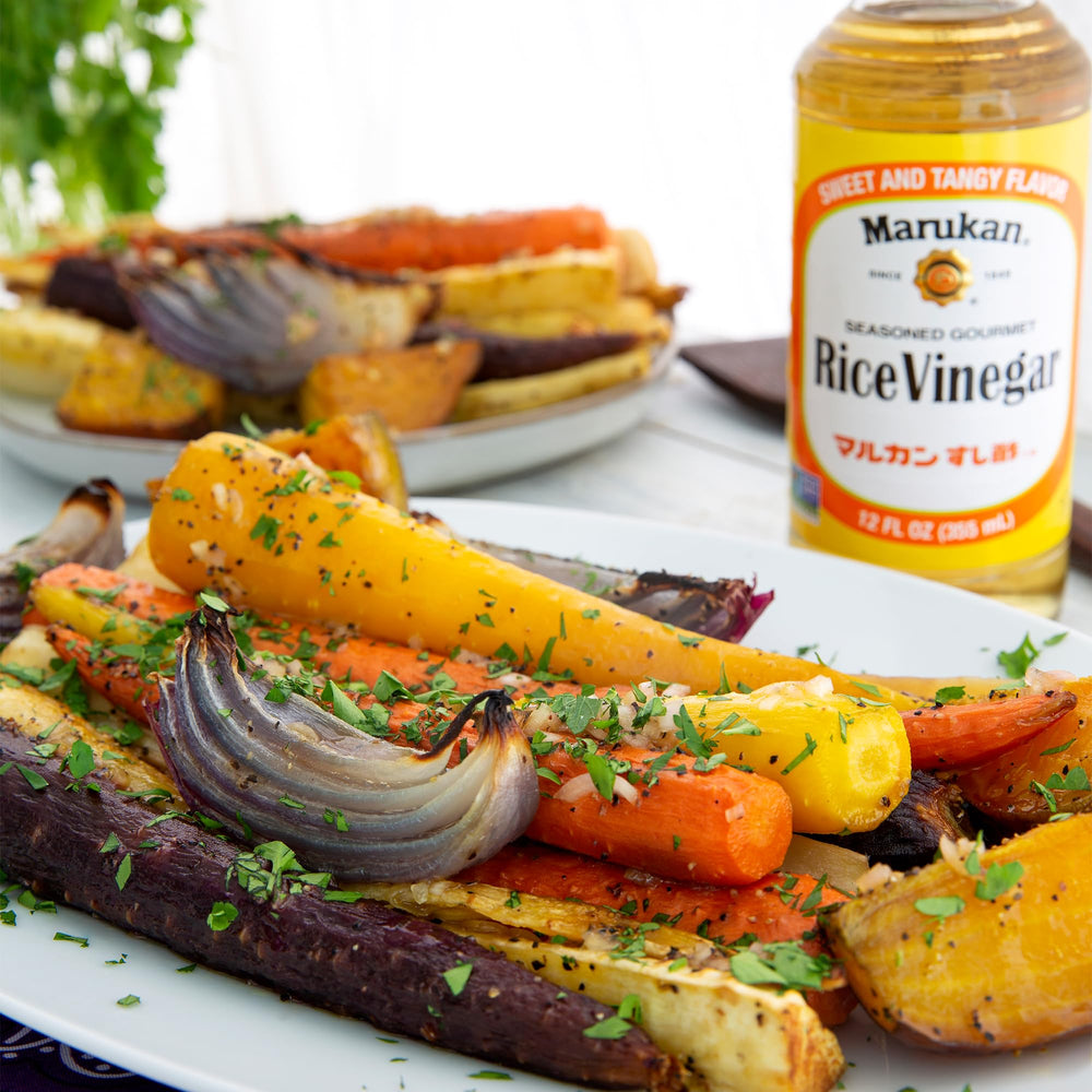 Marukan Seasoned Rice Vinegar enhances salads and seafood with bright tang.