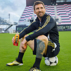 Athlete enjoying Más+ by Messi Orange d’Or after training session.