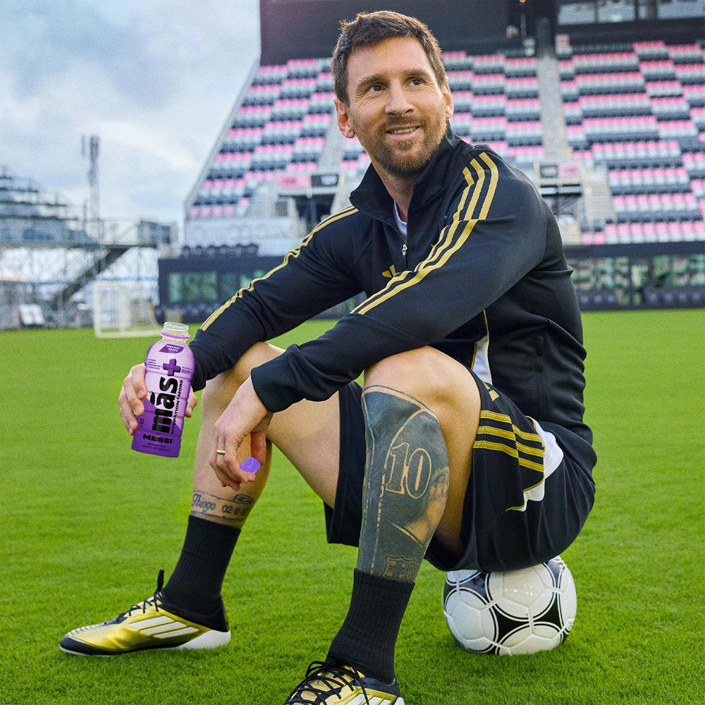 Más+ by Messi Orange Dor bottle front showing caffeine-free hydration option.