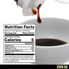 Chin-Su Premium Soy Sauce pours, highlighting rich umami for stir-fries