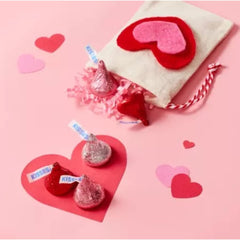 Mashbox Kises valentines candy display bowls and gift arrangements for celebrations.