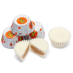 MASHBOX REEs Miniatures Peanut Butter Cups White bulk pack on a dessert table, ideal for events.